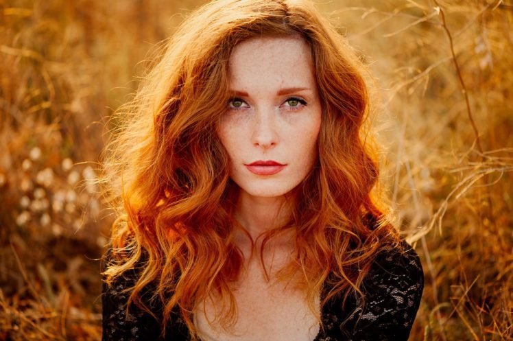 Redhead Girl With Green Eyes