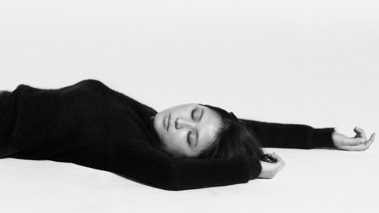 Masami Nagasawa, Lying down, Arms up, Closed eyes, Asian, Women, Black clothing, Simple background HD Wallpaper Desktop Background