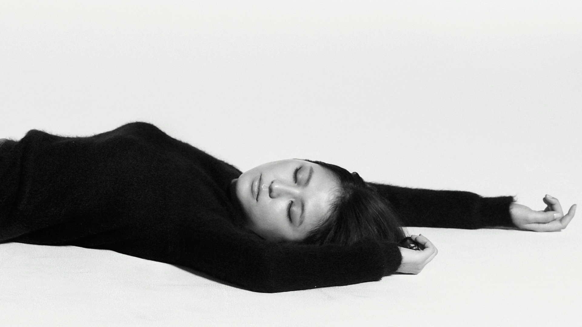Masami Nagasawa, Lying down, Arms up, Closed eyes, Asian, Women, Black clothing, Simple background Wallpaper