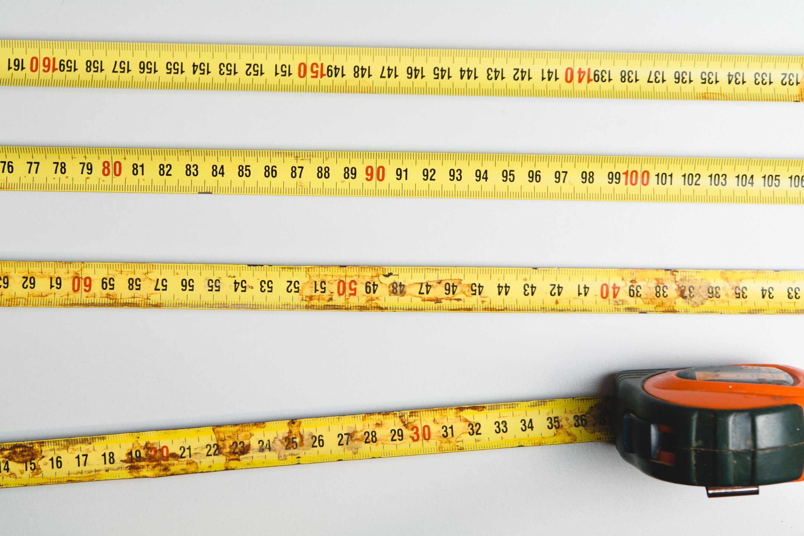 measuring tape, Rust, White background, Numbers Wallpaper