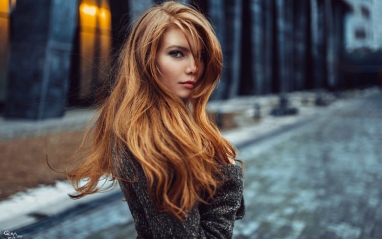 face, Blurred, Women, Redhead, Model, Long hair, Women outdoors, Looking at viewer, Street, Building, Windy, Coats, Depth of field, Sissi Chloe, Georgiy Chernyadyev, Kohl eyes, Antonina Bragina HD Wallpaper Desktop Background