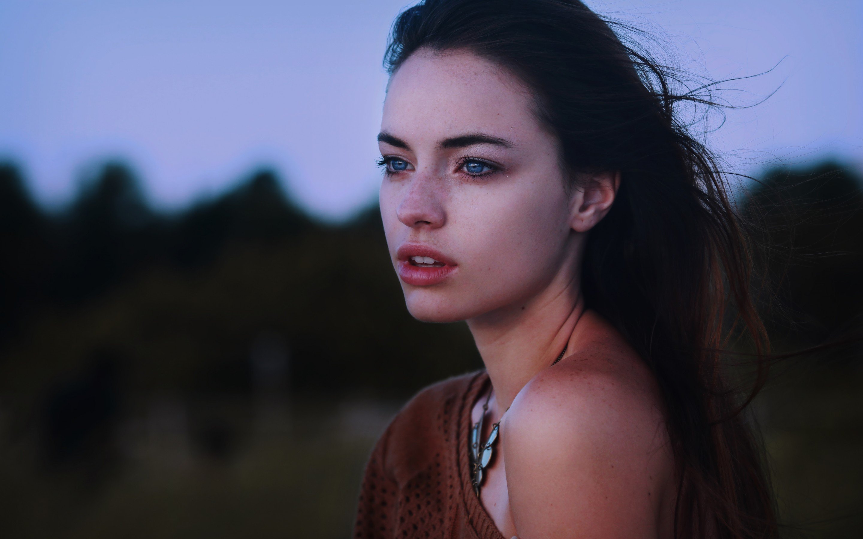 Brunette girl with blue eyes