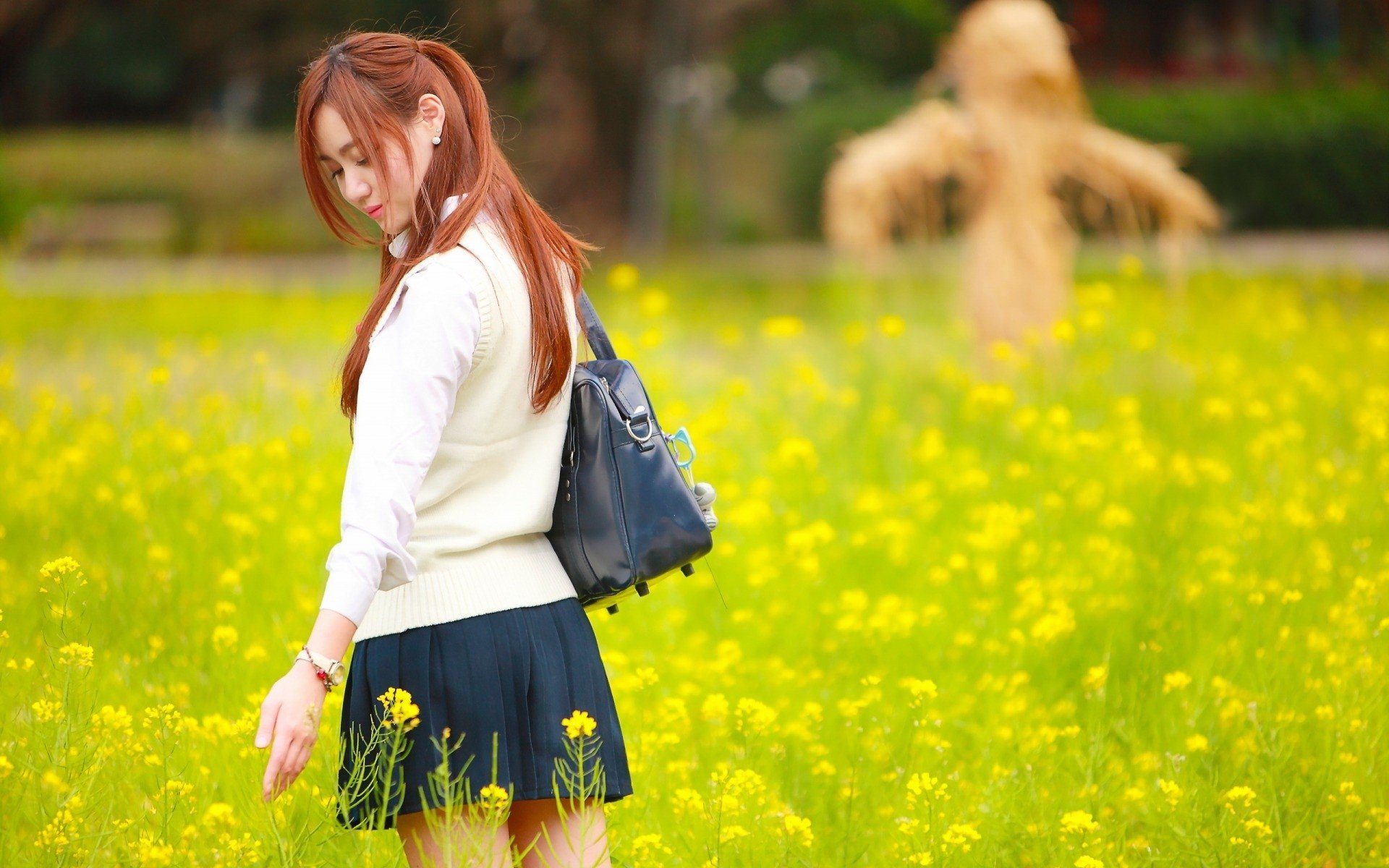 women, Model, Redhead, Long hair, Asian, Closed eyes, Women outdoors, Nature, Field, Yellow flowers, Sweater, Bag, Short skirt, Park Wallpaper