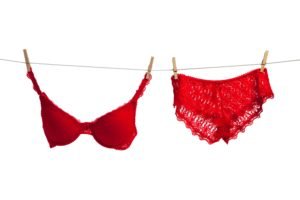 underwear, Red bras, Red panties, White background, Pegs, Cords