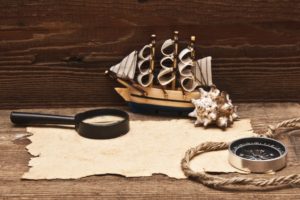 wood, Sailing ship, Magnifying glasses, Compass, Ropes, Sheet