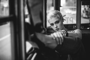 women, Model, Short hair, Blonde, Stefania Ferrario, Looking at viewer, High heels, Monochrome, Vehicle interiors, Face, Depth of field